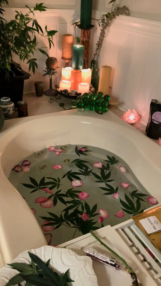 CBD BATH BOMB HEMP LEAVES AND ROSES CBD PLANT IN BACKGROUND SELF-LOVE HEMP SPA